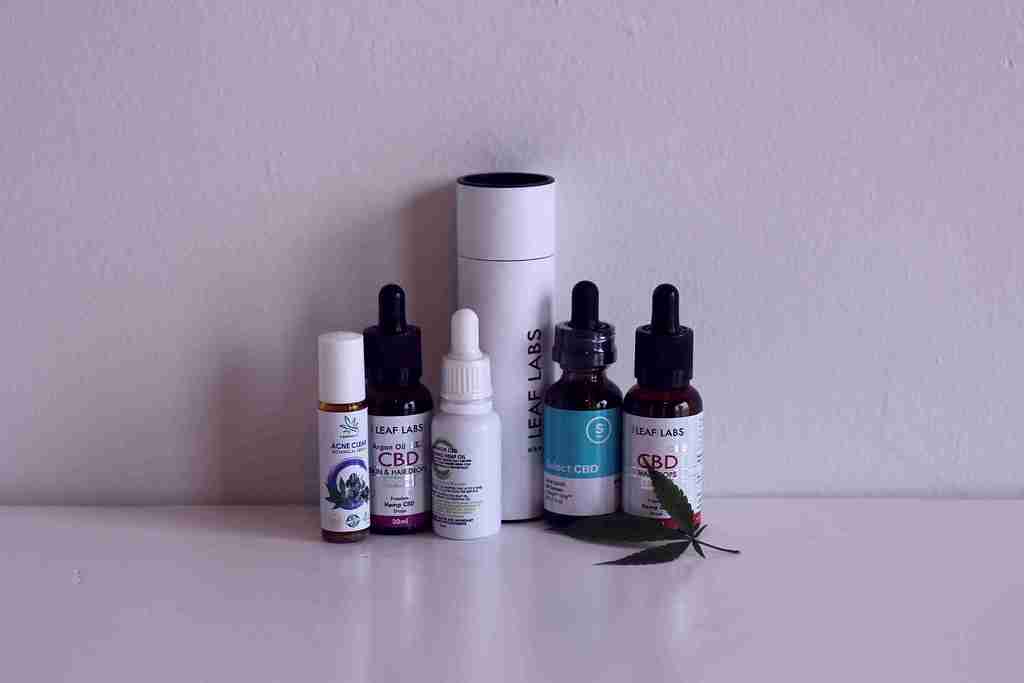 CBD oil bottles lined up for COA and potency checks